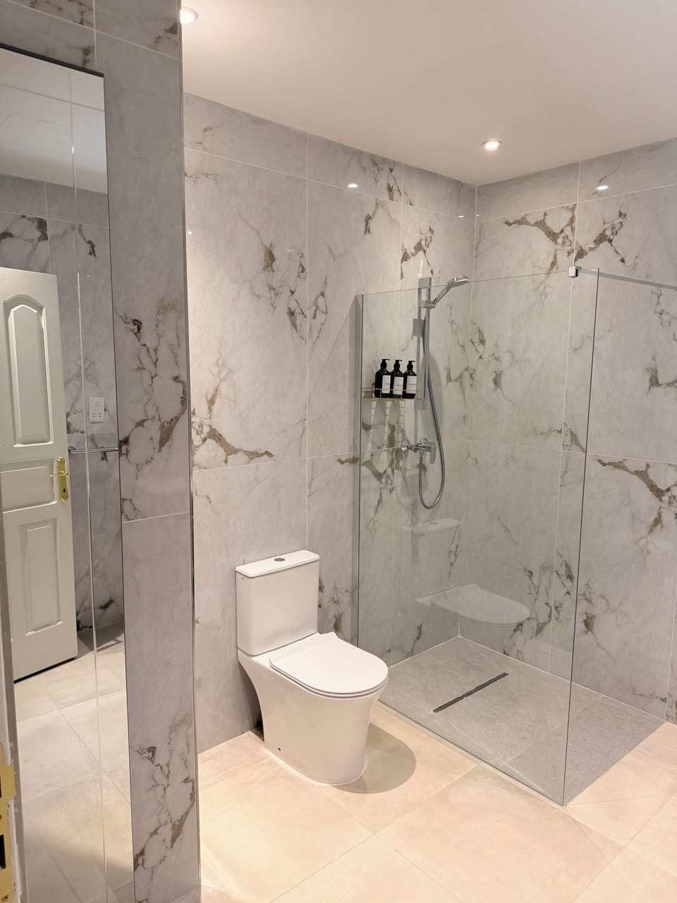 Family Quadruple Room | Bathroom | Shower, towels, soap, shampoo