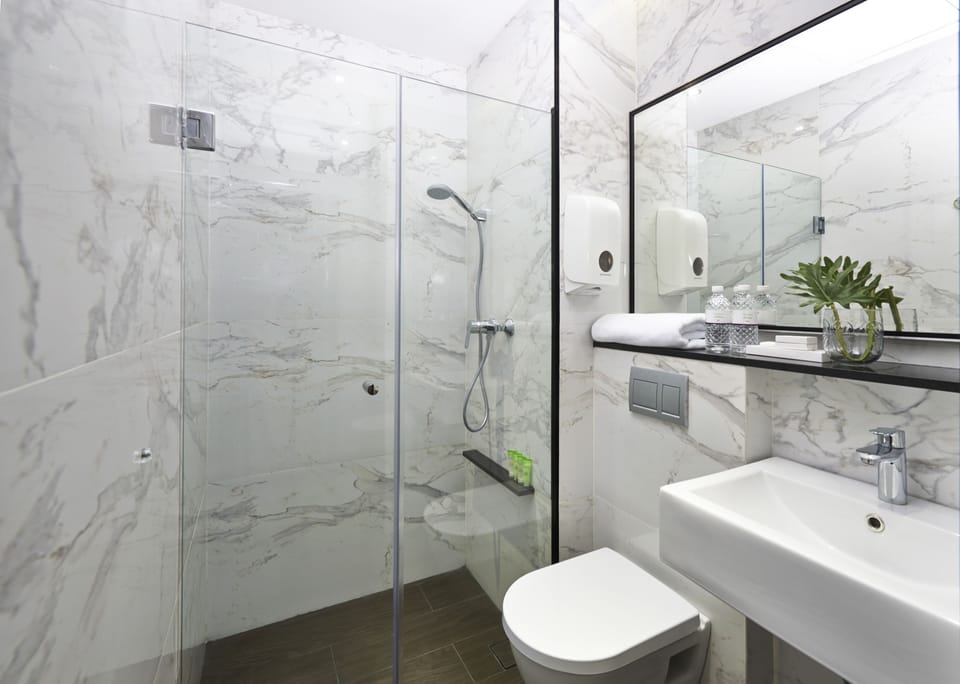 Shower, free toiletries, hair dryer, slippers