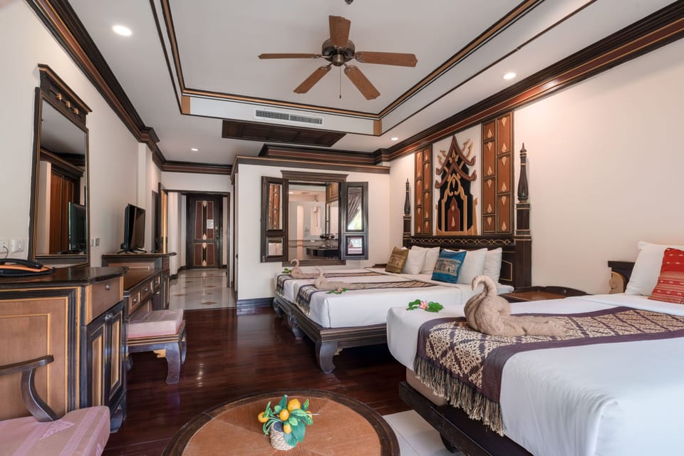 Suite, 2 Twin Beds, Pool View | In-room safe, WiFi (free), bed sheets