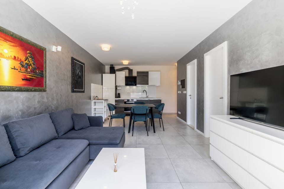 Classic Apartment, Patio, Garden View | Living area | Flat-screen TV