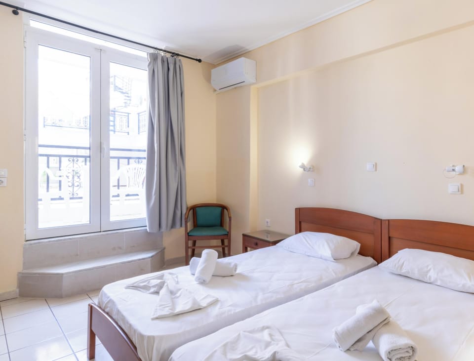 Economy Room, Patio, Pool View | WiFi (free), bed sheets