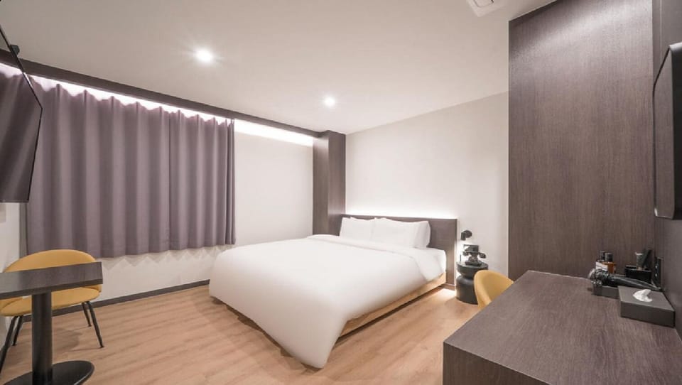 Standard Double Room, City View | Desk, laptop workspace, blackout drapes, soundproofing