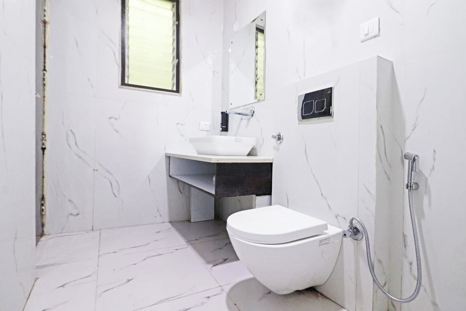 Shower, free toiletries, hair dryer, slippers