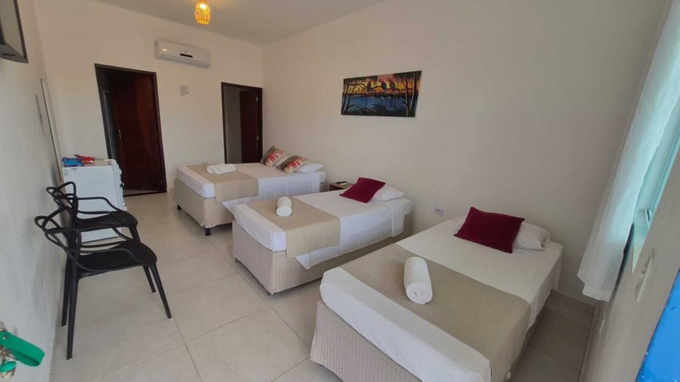 Family Quadruple Room, Garden View | Rollaway beds (surcharge), WiFi (free), bed sheets