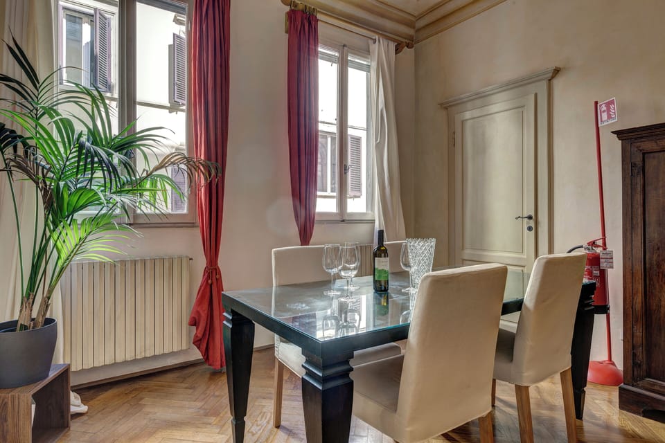 Apartment | Living area | 30-inch flat-screen TV with satellite channels