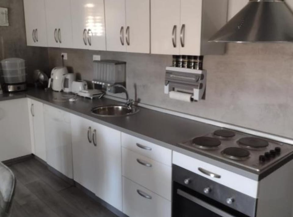 Apartment (Three Bedroom Apartment with Hot Tub) | Private kitchen | Fridge