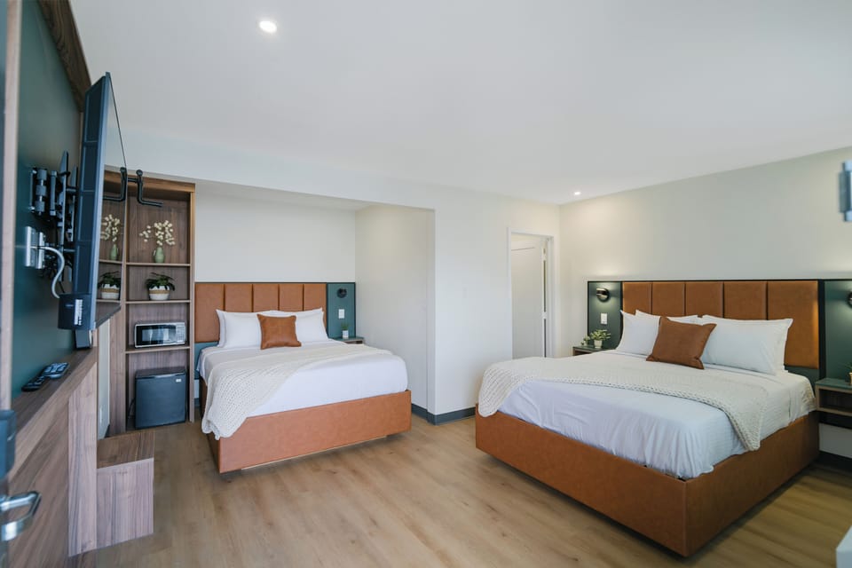 Deluxe Double Room, 2 Queen Beds, Non Smoking | WiFi (free), bed sheets