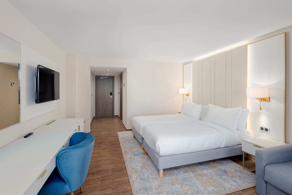 Hypo-allergenic bedding available, minibar (free items), in-room safe