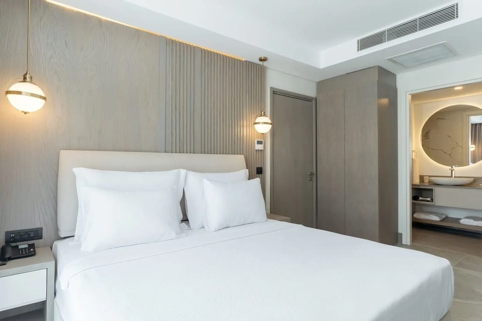 Deluxe Double Room, Balcony, Pool View | WiFi (free), bed sheets