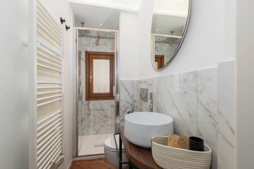 Shower, free toiletries, hair dryer, slippers