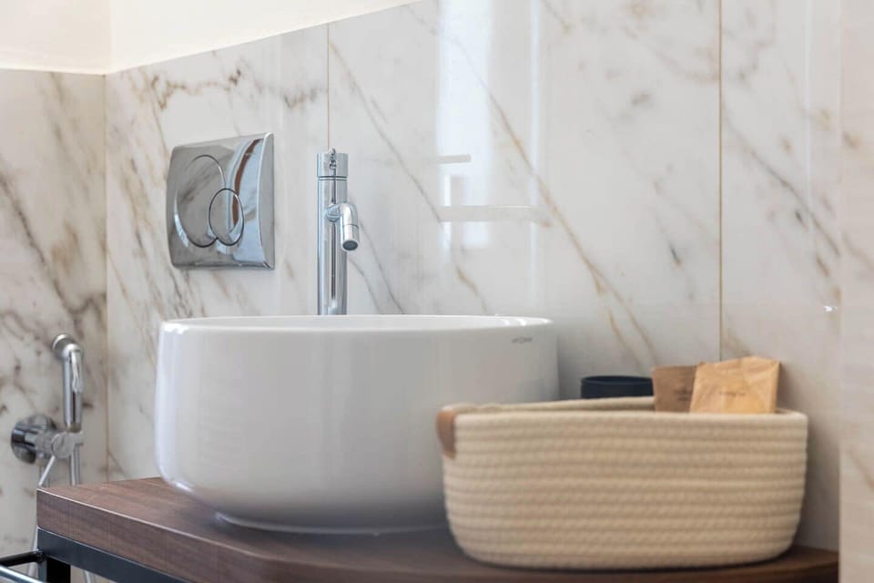 Shower, free toiletries, hair dryer, slippers