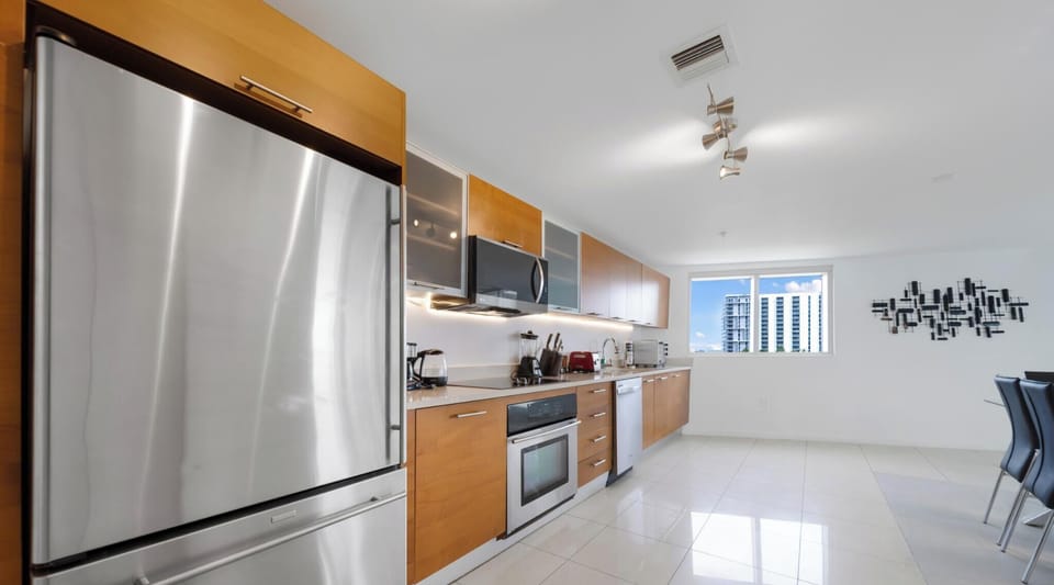 Condo, Balcony, City View | Private kitchen | Espresso maker, fridge, microwave, dishwasher