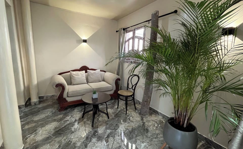 Basic Double Room, Courtyard View | Living area | 15-inch flat-screen TV with satellite channels, Netflix