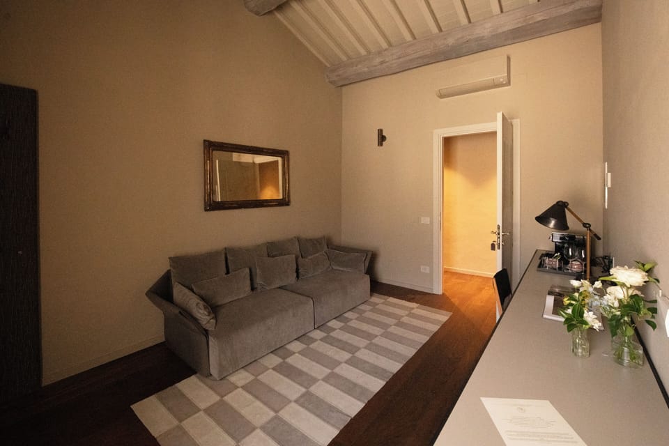 Junior Suite | Living area | 30-inch flat-screen TV with digital channels