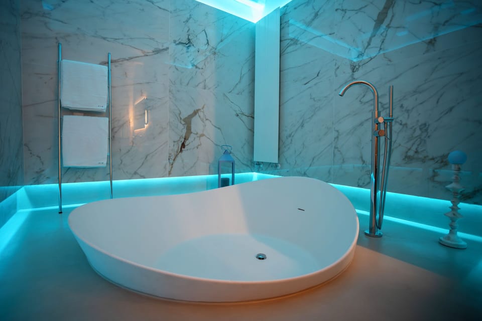 Deluxe Double Room | Bathroom | Hair dryer, slippers, towels, soap