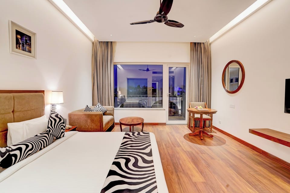 Suite, Pool View | Desk, iron/ironing board, WiFi (free), bed sheets