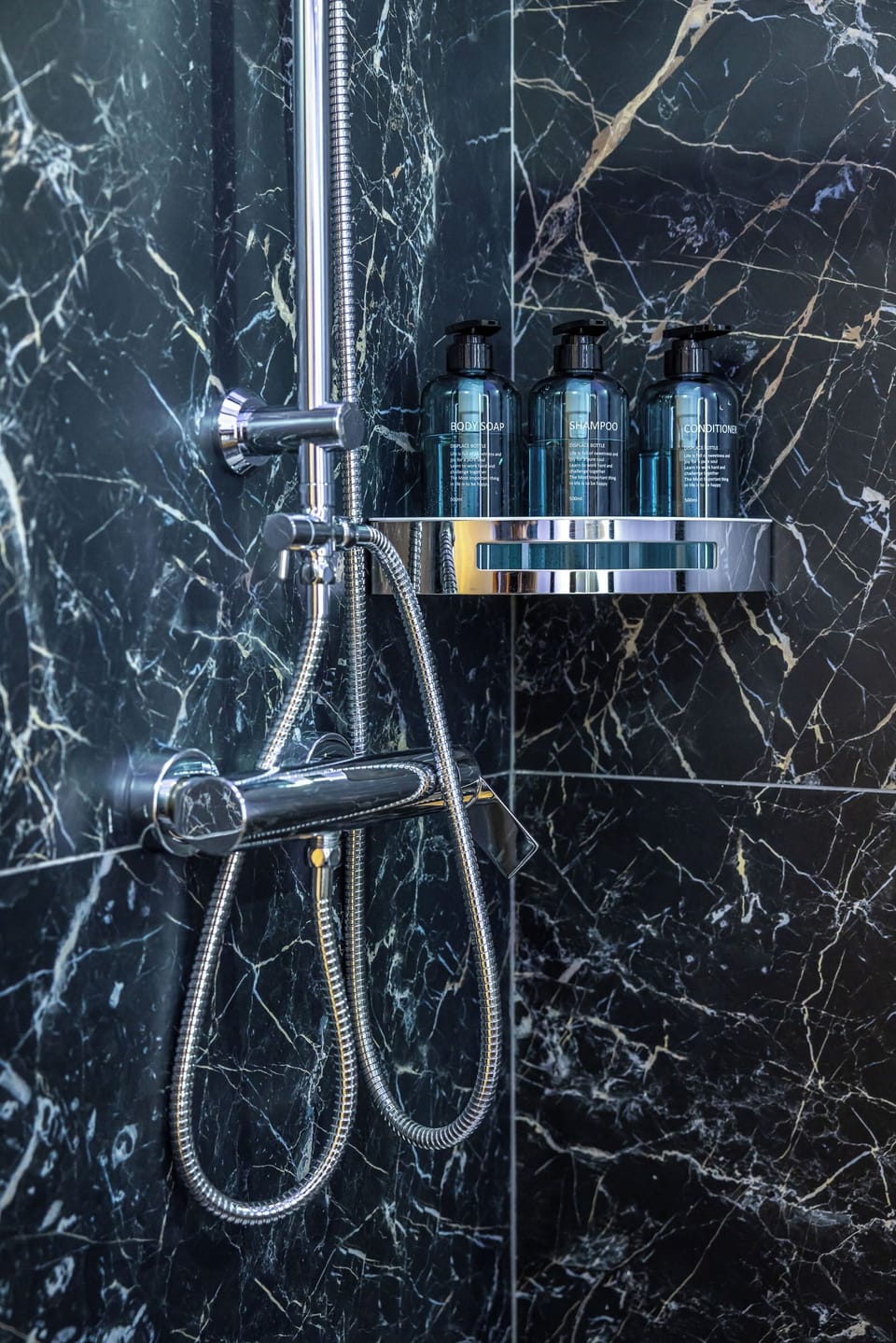 Luxury Suite, City View | Bathroom amenities | Shower, hair dryer, bathrobes, slippers