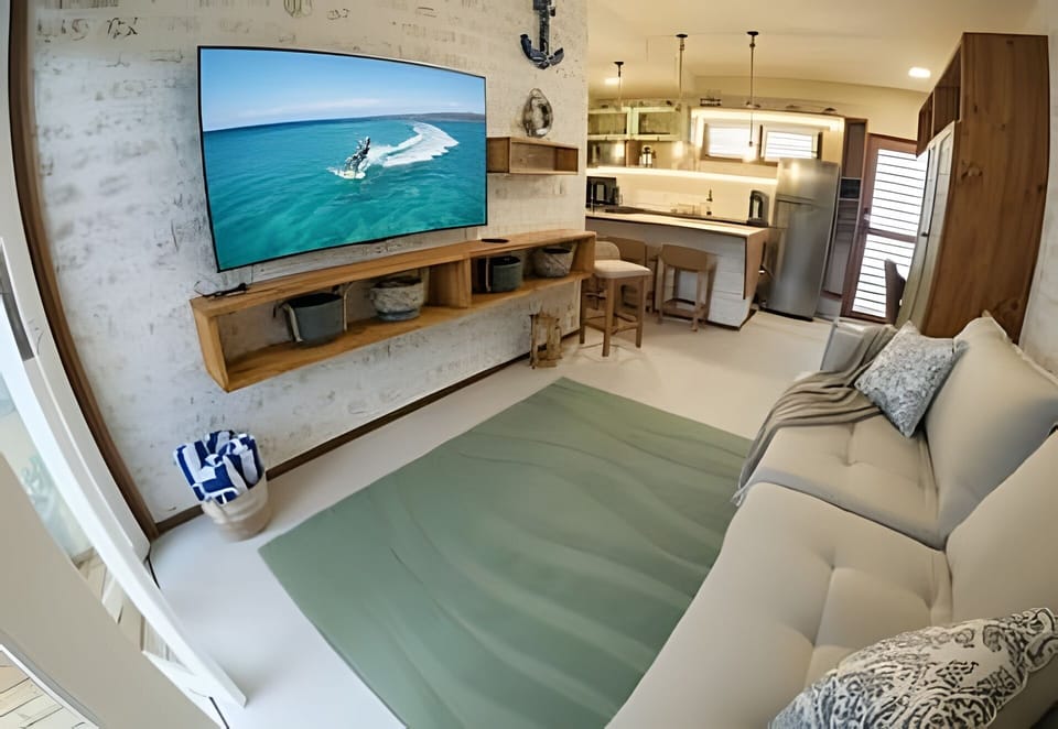 Basic Apartment | Living area | 60-cm Smart TV with digital channels, streaming services