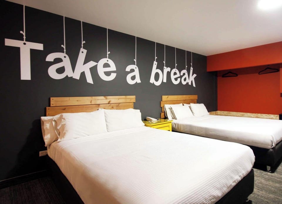 Standard Double Room, City View | Laptop workspace, WiFi (free), bed sheets