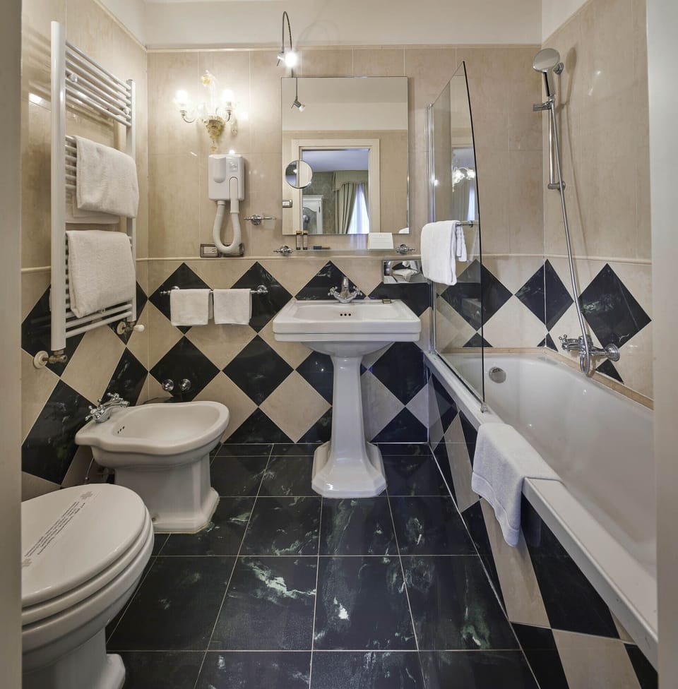 Free toiletries, hair dryer, bidet, towels