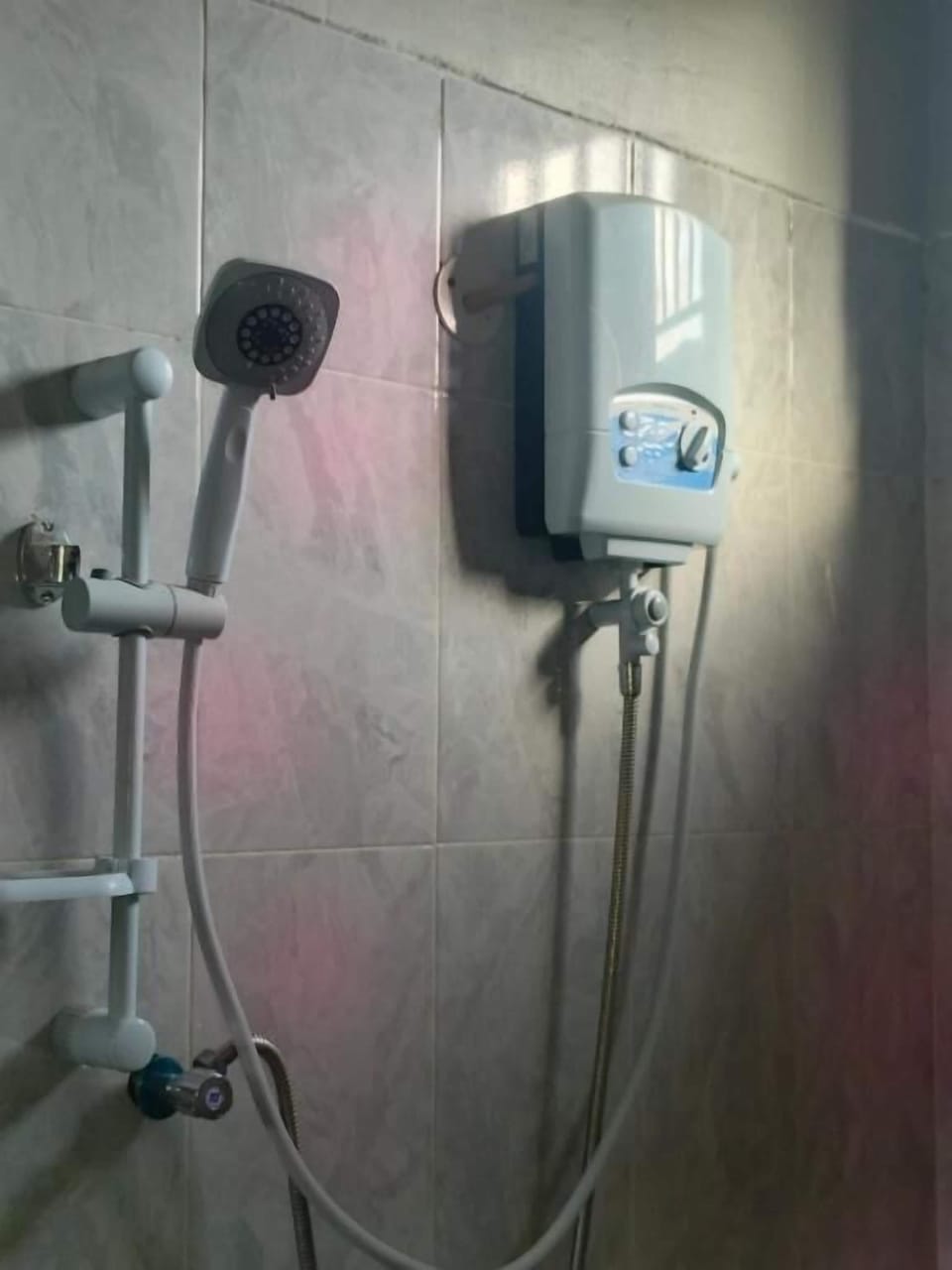 Shower, free toiletries, slippers, towels