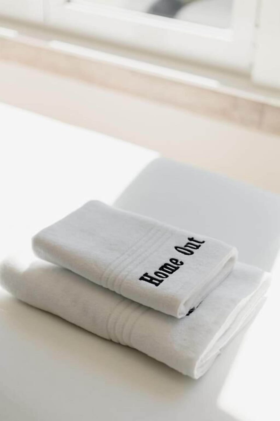 Shower, rainfall showerhead, hair dryer, towels