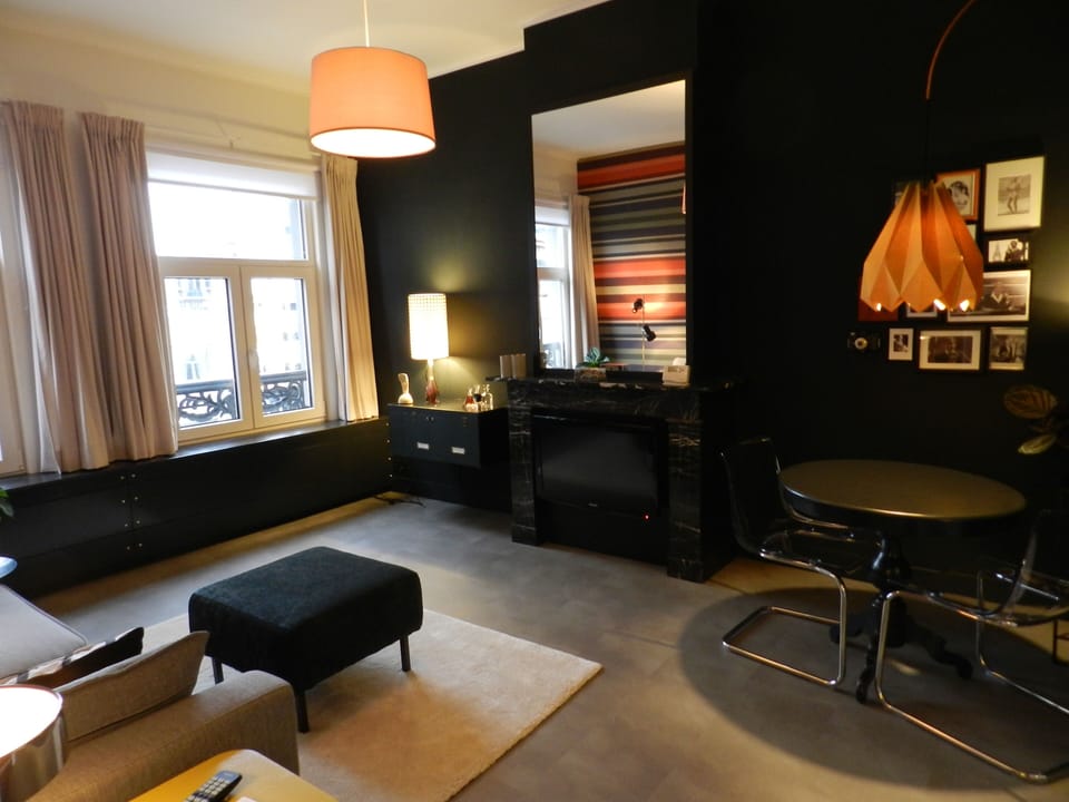 Suite, Garden View | Living room | TV