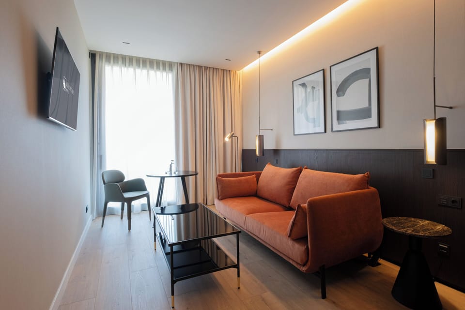 Junior Suite (Family) | Minibar, in-room safe, laptop workspace, blackout drapes