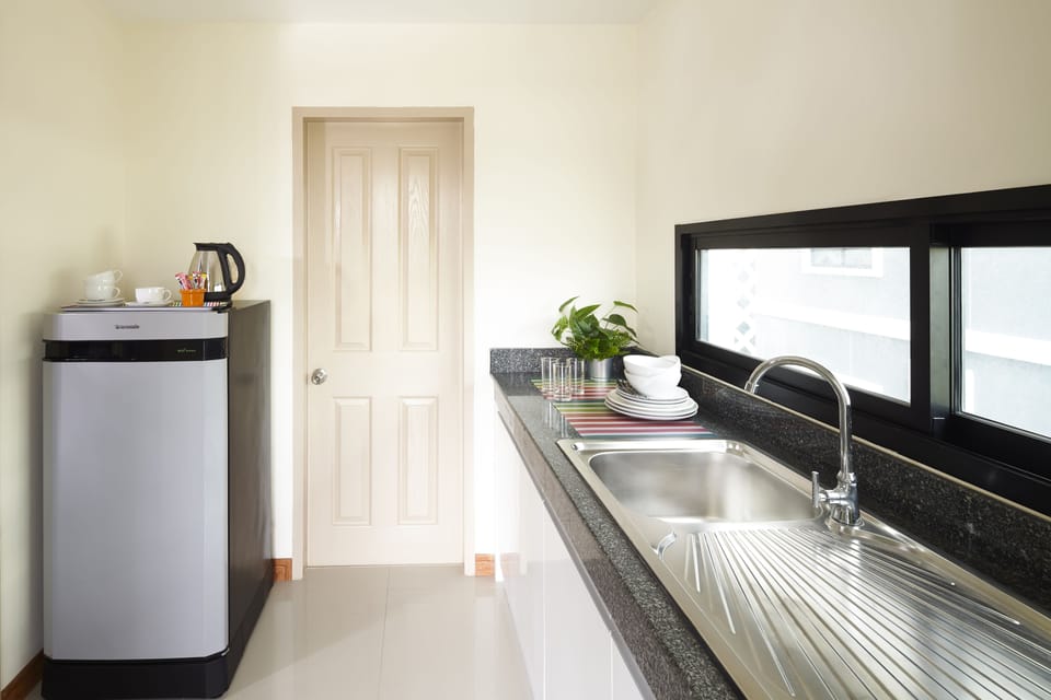 Super Deluxe Room | Private kitchenette | Fridge, electric kettle
