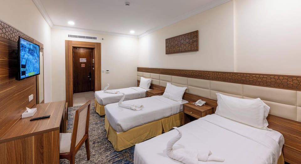 Triple Room | In-room safe, blackout drapes, iron/ironing board (on request)