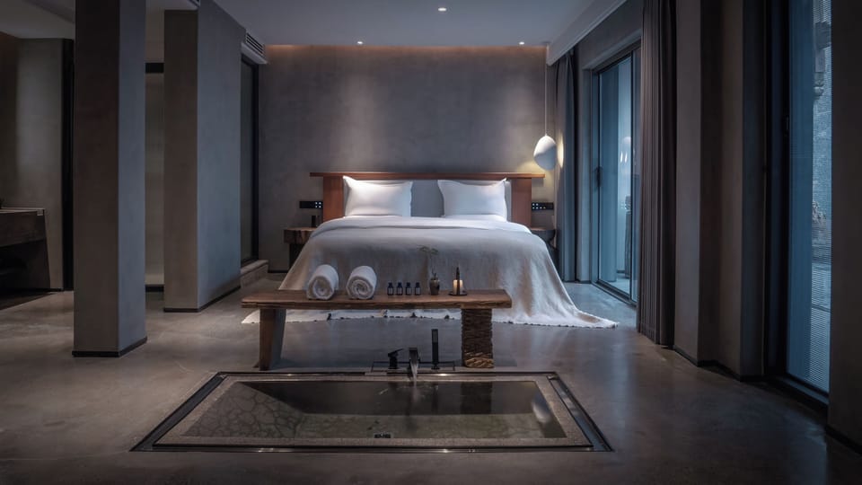 Premium bedding, down comforters, memory foam beds, minibar (free items)