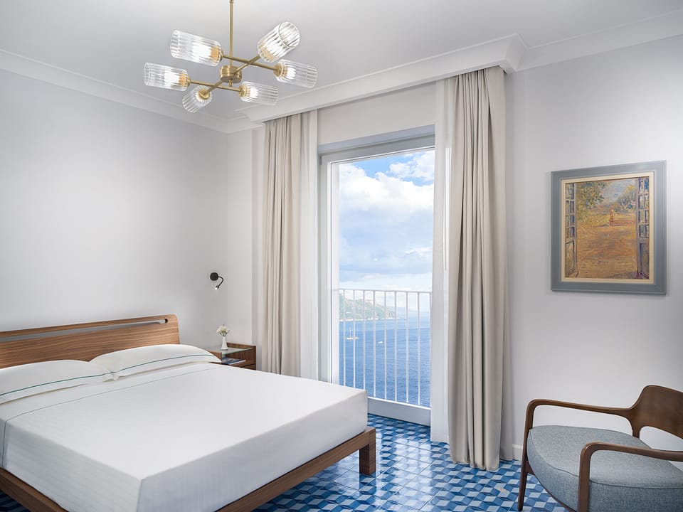 Comfort Double Room, Sea View | Premium bedding, minibar, in-room safe, blackout drapes