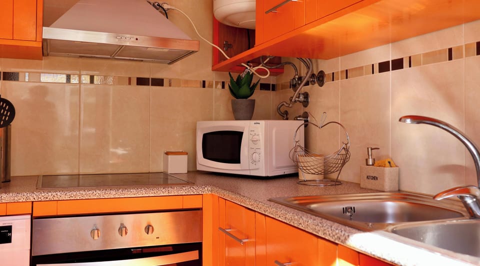 Apartment, Patio, City View | Private kitchen