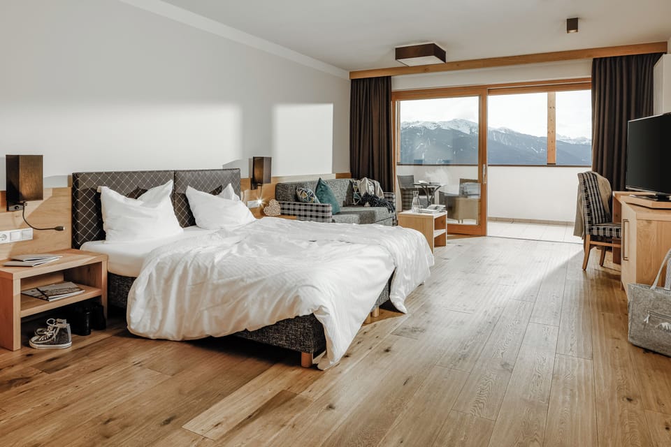 Suite Dolomite View | Hypo-allergenic bedding, minibar, in-room safe, blackout drapes