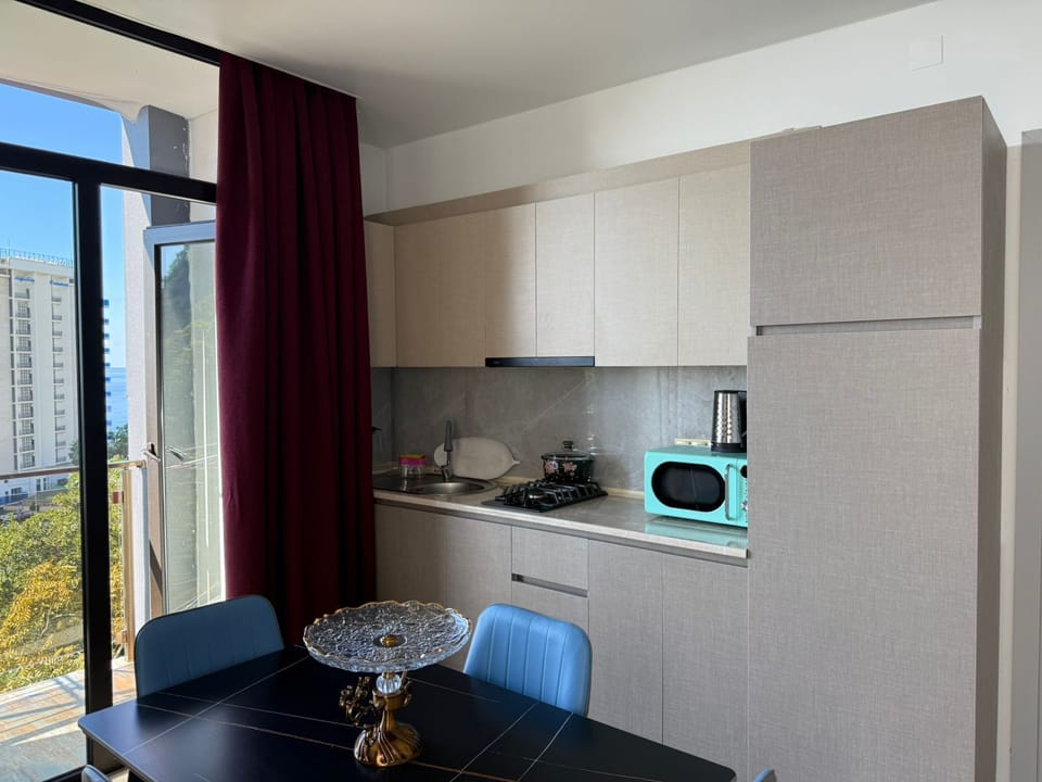 Deluxe Apartment, Balcony, Sea View | Minibar, WiFi (free), bed sheets