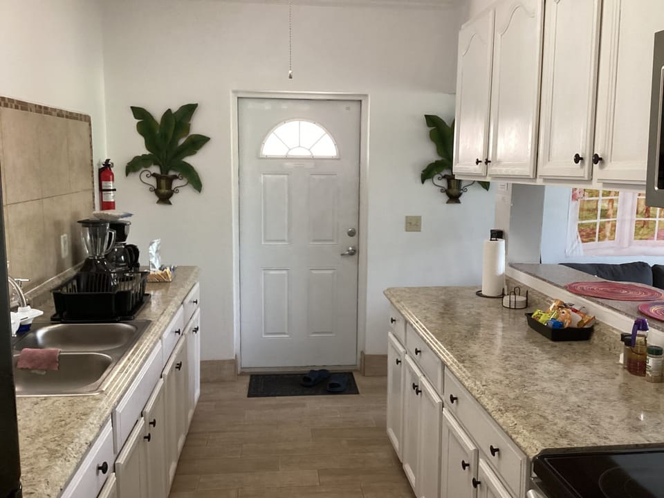 Condo, Non Smoking, Garden View | Desk, laptop workspace, iron/ironing board, WiFi (free)