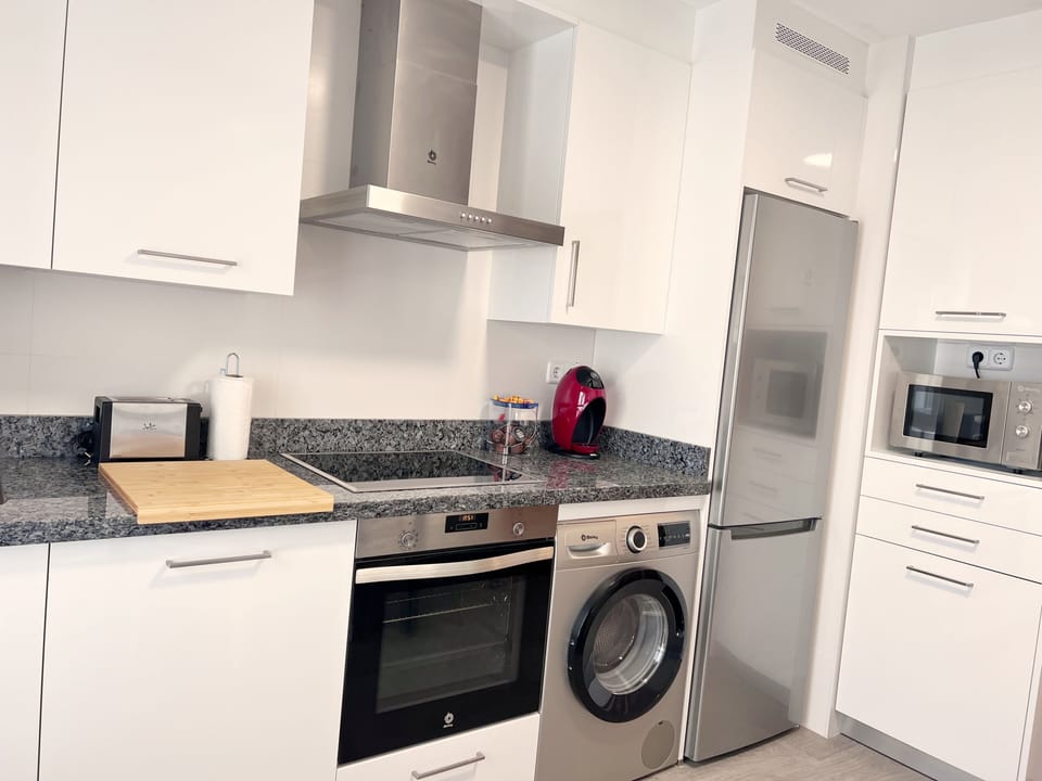 Family Apartment, City View | Private kitchen | Oven, stovetop, cookware/dishes/utensils