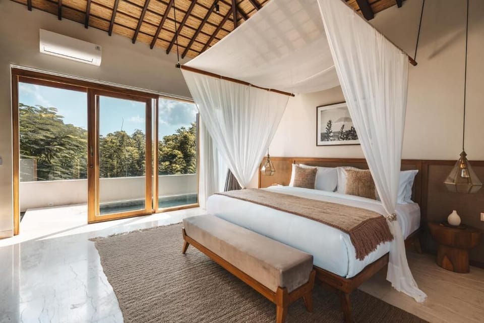 Double Room, Balcony, Partial Sea View | Minibar, in-room safe, blackout drapes, soundproofing