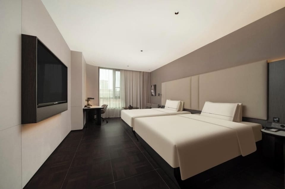 Premium bedding, down comforters, memory foam beds, minibar (free items)