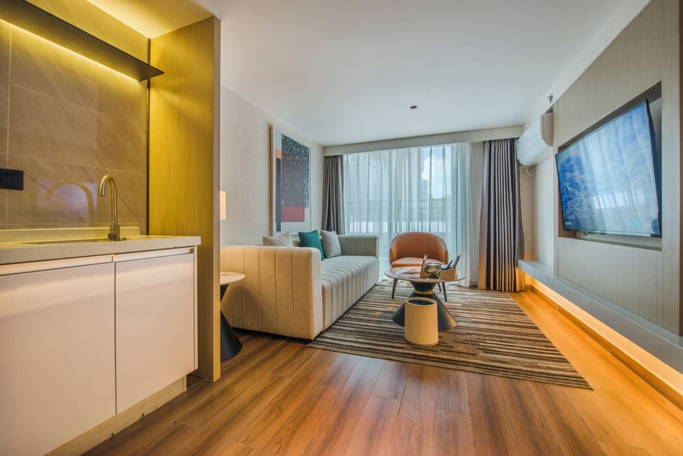 Comfort Loft | Living area | 40-inch LCD TV with satellite channels