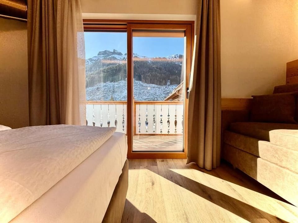 Superior Quadruple Room, Balcony, Mountain View | In-room safe, soundproofing, iron/ironing board, WiFi (free)