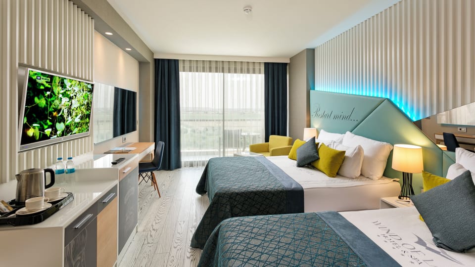 Deluxe Standard Room | Living area | LED TV