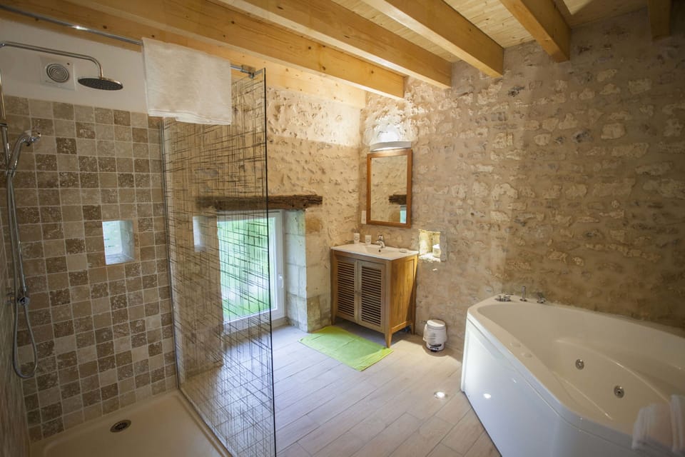 Premium Suite, Jetted Tub | Bathroom | Shower, free toiletries, hair dryer, bathrobes