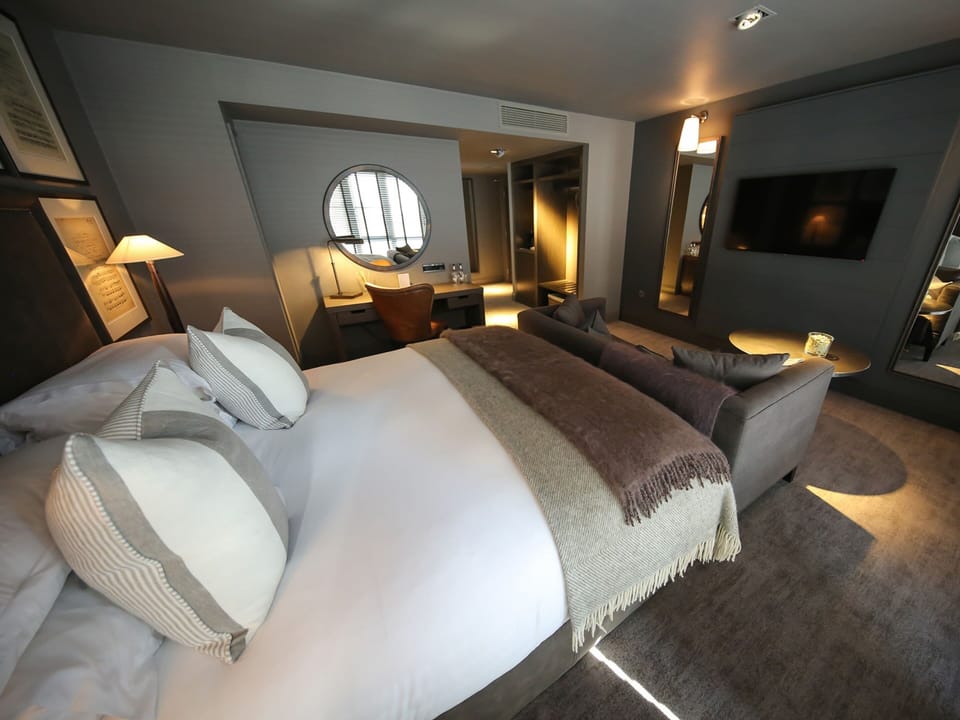 Signature Suite | Premium bedding, in-room safe, desk, iron/ironing board