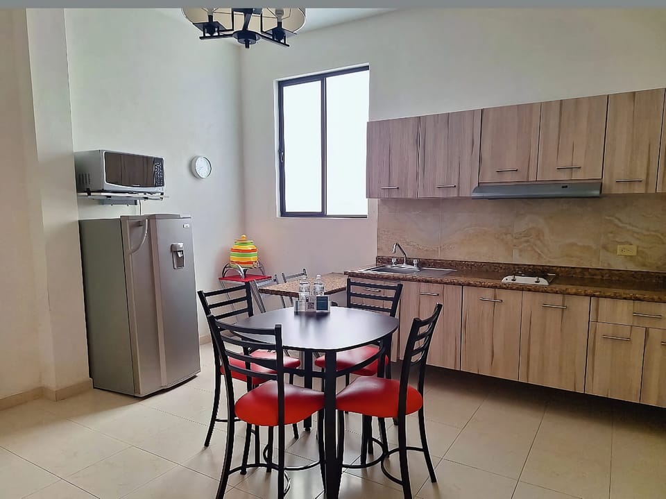 Comfort Suite, Kitchenette | Private kitchen | Coffee/tea maker