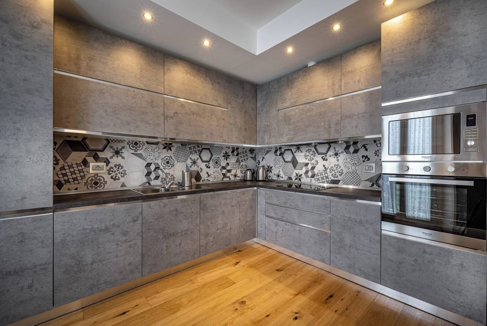 Apartment, 4 Bedrooms, 2 Bathrooms | Private kitchen | Coffee/tea maker, full-size fridge, microwave, stovetop