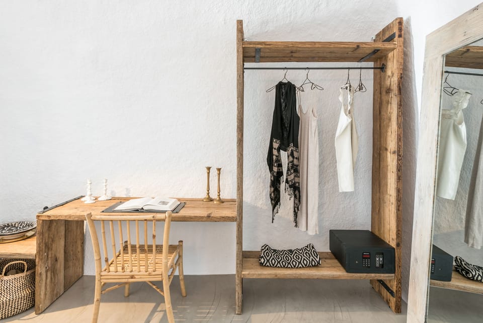 Grand Suite, 2 Bedrooms, Hot Tub, Sea View (Private Cave) | 1 bedroom, free minibar items, in-room safe, individually decorated