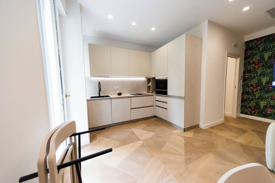 Luxury Apartment, Balcony, City View | Private kitchen | Cleaning supplies, freezer