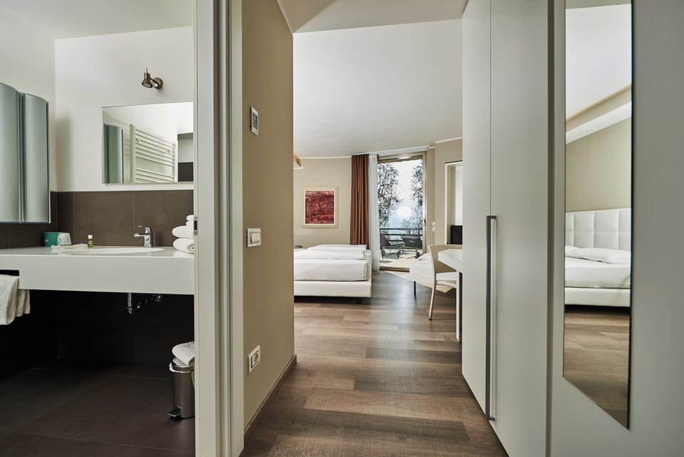 Exclusive Double Room, Lake View | In-room safe, desk, laptop workspace, blackout drapes