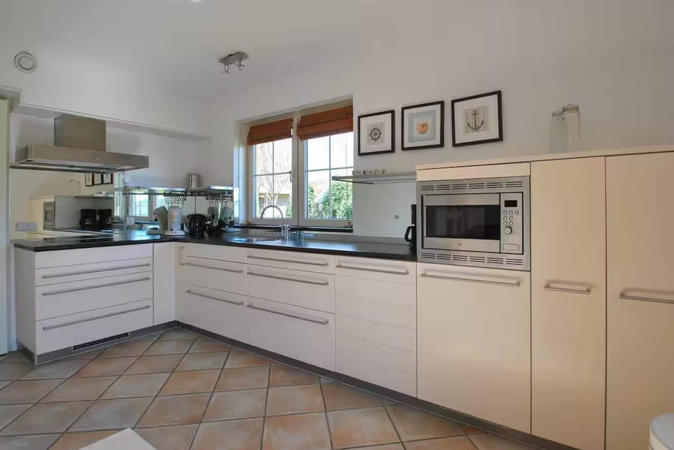 House | Private kitchen | Highchair, cleaning supplies